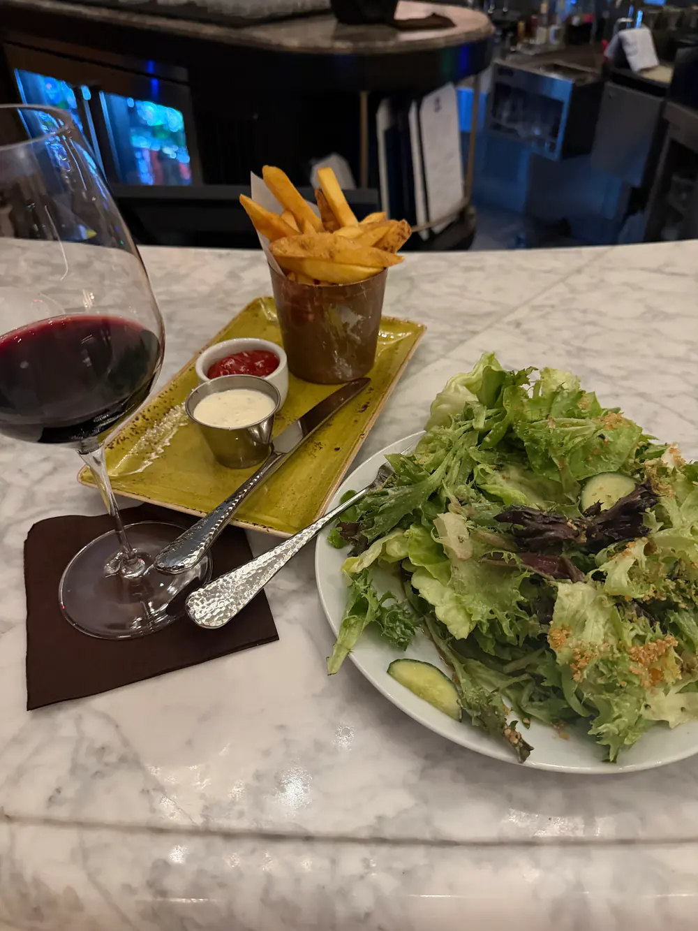 Bibb and avocado salad with fries at Blue Aster Conrad Hotel Nashville